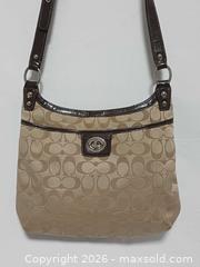 MaxSold Auction: Coach Penelope Signature Khaki Jacquard Hippie Crossbody Bag F19259 - Toronto (Ontario, Canada) PARTNER MANAGED Reseller Online Auction - Queen Street West