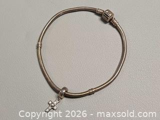 MaxSold Auction: Pandora 925 Silver Smooth Charm with Cross - Toronto (Ontario, Canada) PARTNER MANAGED Reseller Online Auction - Queen Street West