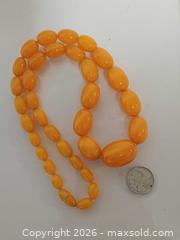 MaxSold Auction: Vintage Large 30mm Bakelite Beads Necklace  - Toronto (Ontario, Canada) PARTNER MANAGED Reseller Online Auction - Queen Street West