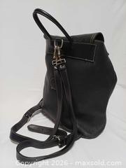 MaxSold Auction: Vintage Roots Canada Black Pebbled Leather Drawstring Backpack Bag  - Toronto (Ontario, Canada) PARTNER MANAGED Reseller Online Auction - Queen Street West