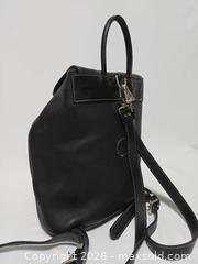 MaxSold Auction: Vintage Roots Canada Black Pebbled Leather Drawstring Backpack Bag  - Toronto (Ontario, Canada) PARTNER MANAGED Reseller Online Auction - Queen Street West