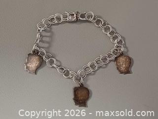 MaxSold Auction: Vintage Sterling Silver Charms Bracelet Marked  - Toronto (Ontario, Canada) PARTNER MANAGED Reseller Online Auction - Queen Street West