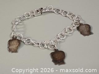 MaxSold Auction: Vintage Sterling Silver Charms Bracelet Marked  - Toronto (Ontario, Canada) PARTNER MANAGED Reseller Online Auction - Queen Street West