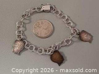 MaxSold Auction: Vintage Sterling Silver Charms Bracelet Marked  - Toronto (Ontario, Canada) PARTNER MANAGED Reseller Online Auction - Queen Street West