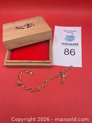 MaxSold Auction: 10K Gold Bracelet with tennis player charm - Oakville (Ontario, Canada) PARTNER MANAGED Estate Sale Online Auction -  Timber Lane