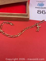 MaxSold Auction: 10K Gold Bracelet with tennis player charm - Oakville (Ontario, Canada) PARTNER MANAGED Estate Sale Online Auction -  Timber Lane