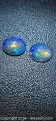 MaxSold Auction: Absolutely gorgeous pair crystal Jelly opal - Hamilton (Ontario, Canada) PARTNER MANAGED Reseller Online Auction - Mohawk Road West