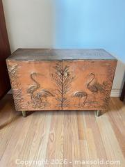 MaxSold Auction: Copper-Covered Wooden 2-Door Console with Embossed Panels - Greater Sudbury (Ontario, Canada) PARTNER MANAGED Estate Sale Online Auction -  Pebble Hill Place