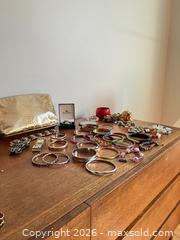 MaxSold Auction: Mixed Costume Jewelry Lot: Bangles, Bracelets, Clutch, Watch (16-30) - Greater Sudbury (Ontario, Canada) PARTNER MANAGED Estate Sale Online Auction -  Pebble Hill Place