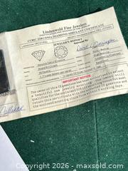 MaxSold Auction: Cubic Zirconia Diamond with COA - Livermore (California, USA) SELLER MANAGED Estate Sale Online Auction - Hansen Road