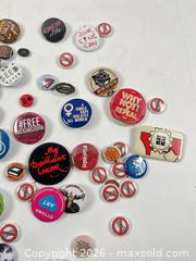 MaxSold Auction: A LOT OF VINTAGE COLLECTOR PINS AND BUTTONS - Toronto (Ontario, Canada) PARTNER MANAGED Moving Online Auction - Brunswick Avenue