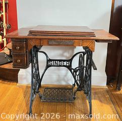 MaxSold Auction: ANTIQUE SINGER OAK AND IRON SEWING MACHINE TABLE - Toronto (Ontario, Canada) PARTNER MANAGED Moving Online Auction - Brunswick Avenue