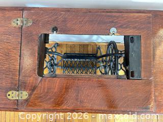 MaxSold Auction: ANTIQUE SINGER OAK AND IRON SEWING MACHINE TABLE - Toronto (Ontario, Canada) PARTNER MANAGED Moving Online Auction - Brunswick Avenue