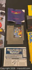 MaxSold Auction: Nintendo Super Mario 3 with two Atari games and Nintendo pinbot - Ottawa (Ontario, Canada) SELLER MANAGED Downsizing Online Auction - Seabrooke Drive