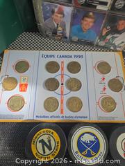 MaxSold Auction: Random hockey card coin Puck and pin collection - Ottawa (Ontario, Canada) SELLER MANAGED Downsizing Online Auction - Seabrooke Drive