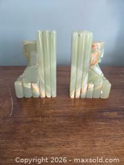 MaxSold Auction: These are a pair of vintage hand-carved onyx stone bookends, likely originating Mexico  - Ottawa (Ontario, Canada) SELLER MANAGED Downsizing Online Auction - Seabrooke Drive
