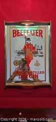 MaxSold Auction: This is a vintage Beefeater London Distilled Dry Gin advertising mirror serving plate - Ottawa (Ontario, Canada) SELLER MANAGED Downsizing Online Auction - Seabrooke Drive