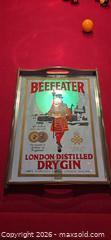 MaxSold Auction: This is a vintage Beefeater London Distilled Dry Gin advertising mirror serving plate - Ottawa (Ontario, Canada) SELLER MANAGED Downsizing Online Auction - Seabrooke Drive