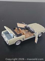 MaxSold Auction: White Ford Mustang convertible metal diecast car - Ottawa (Ontario, Canada) SELLER MANAGED Downsizing Online Auction - Seabrooke Drive