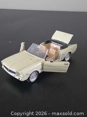 MaxSold Auction: White Ford Mustang convertible metal diecast car - Ottawa (Ontario, Canada) SELLER MANAGED Downsizing Online Auction - Seabrooke Drive