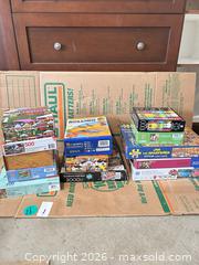 MaxSold Auction: Mixed Lot of Jigsaw Puzzle Boxes — Approximately 12 - Delta (British Columbia, Canada) SELLER MANAGED Estate Sale Online Auction -  55b Street