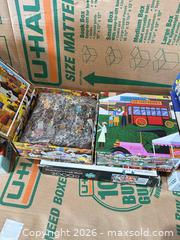 MaxSold Auction: Mixed Lot of Jigsaw Puzzle Boxes — Approximately 12 - Delta (British Columbia, Canada) SELLER MANAGED Estate Sale Online Auction -  55b Street