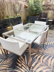 MaxSold Auction: Outdoor dining set - glass top table with 4 white chairs and outdoor carpet - Delta (British Columbia, Canada) SELLER MANAGED Estate Sale Online Auction -  55b Street