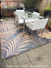 MaxSold Auction: Outdoor dining set - glass top table with 4 white chairs and outdoor carpet - Delta (British Columbia, Canada) SELLER MANAGED Estate Sale Online Auction -  55b Street