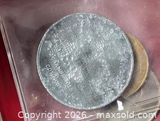MaxSold Auction: Coin Collection In red plastic sleeve holder  - South Frontenac (Ontario, Canada) SELLER MANAGED Downsizing Online Auction - Battersea Road