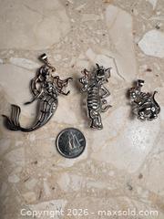 MaxSold Auction: Disney Character Sterling Silver Pendants - London (Ontario, Canada) SELLER MANAGED Downsizing Online Auction - Marconi Boulevard