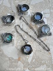 MaxSold Auction: Mixed Lot of 6 Stainless Steel lockets and chains - London (Ontario, Canada) SELLER MANAGED Downsizing Online Auction - Marconi Boulevard