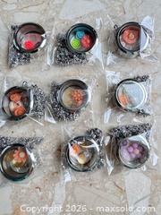 MaxSold Auction: Mixed Lot of 9 Stainless Steel Locket necklaces  - London (Ontario, Canada) SELLER MANAGED Downsizing Online Auction - Marconi Boulevard