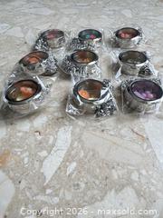 MaxSold Auction: Mixed Lot of 9 Stainless Steel Locket necklaces  - London (Ontario, Canada) SELLER MANAGED Downsizing Online Auction - Marconi Boulevard