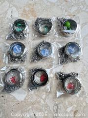MaxSold Auction: Mixed Lot of 9 Stainless Steel Lockets and Chains - London (Ontario, Canada) SELLER MANAGED Downsizing Online Auction - Marconi Boulevard