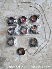 MaxSold Auction: Mixed lot of 9 Stainless Steel Lockets & Chains - London (Ontario, Canada) SELLER MANAGED Downsizing Online Auction - Marconi Boulevard