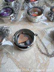MaxSold Auction: Mixed lot of 9 Stainless Steel Lockets & Chains - London (Ontario, Canada) SELLER MANAGED Downsizing Online Auction - Marconi Boulevard