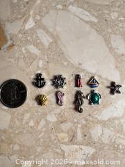 MaxSold Auction: Mixed lot of ocean sea charms - London (Ontario, Canada) SELLER MANAGED Downsizing Online Auction - Marconi Boulevard