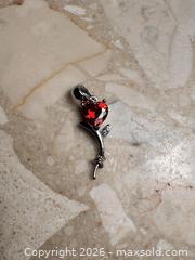 MaxSold Auction: Sterling Silver Flower Pendants - London (Ontario, Canada) SELLER MANAGED Downsizing Online Auction - Marconi Boulevard