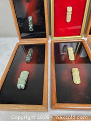 MaxSold Auction: collection of framed M?ori carvings, likely representing traditional symbols  - Toronto (Ontario, Canada) SELLER MANAGED Reseller Online Auction - Dartmoor Drive