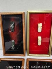 MaxSold Auction: collection of framed M?ori carvings, likely representing traditional symbols  - Toronto (Ontario, Canada) SELLER MANAGED Reseller Online Auction - Dartmoor Drive