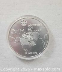 MaxSold Auction: 1973 CANADA Queen Elizabeth II Olympics Montreal World Map Silver $5 Coin - Mississauga (Ontario, Canada) SELLER MANAGED Downsizing Online Auction - Golden Orchard Drive (CONDO)