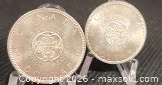 MaxSold Auction: Two 1964 CANADA Quebec Charlottetown Antique Genuine BIG SILVER Dollar Coin - Mississauga (Ontario, Canada) SELLER MANAGED Downsizing Online Auction - Golden Orchard Drive (CONDO)