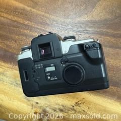 MaxSold Auction: Lot of 2 Canon Film Cameras EOS Elan 2 & 50D - Richmond Hill (Ontario, Canada) SELLER MANAGED Reseller Online Auction - Newkirk Road (STORAGE)