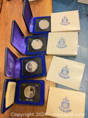 MaxSold Auction: 1973,74,75,76 Canada uncirculated $1 coin lot  - Toronto (Ontario, Canada) SELLER MANAGED Downsizing Online Auction - Applefield Drive