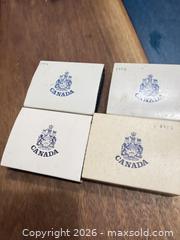 MaxSold Auction: 1973,74,75,76 Canada uncirculated $1 coin lot  - Toronto (Ontario, Canada) SELLER MANAGED Downsizing Online Auction - Applefield Drive