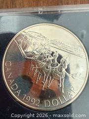 MaxSold Auction: 1992  CANADA PROOF LIKE .925 STERLING silver dollar MINT - Toronto (Ontario, Canada) SELLER MANAGED Downsizing Online Auction - Applefield Drive