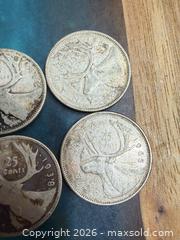 MaxSold Auction: Lot of 4 Canada 25 cents 80% silver  - Toronto (Ontario, Canada) SELLER MANAGED Downsizing Online Auction - Applefield Drive