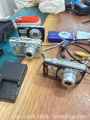 MaxSold Auction: Lot of 5 song cyber shot camera  - Toronto (Ontario, Canada) SELLER MANAGED Downsizing Online Auction - Applefield Drive