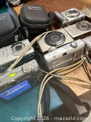 MaxSold Auction: Lot of 9 canon camera  - Toronto (Ontario, Canada) SELLER MANAGED Downsizing Online Auction - Applefield Drive