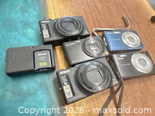 MaxSold Auction: Nikon camera lot  - Toronto (Ontario, Canada) SELLER MANAGED Downsizing Online Auction - Applefield Drive